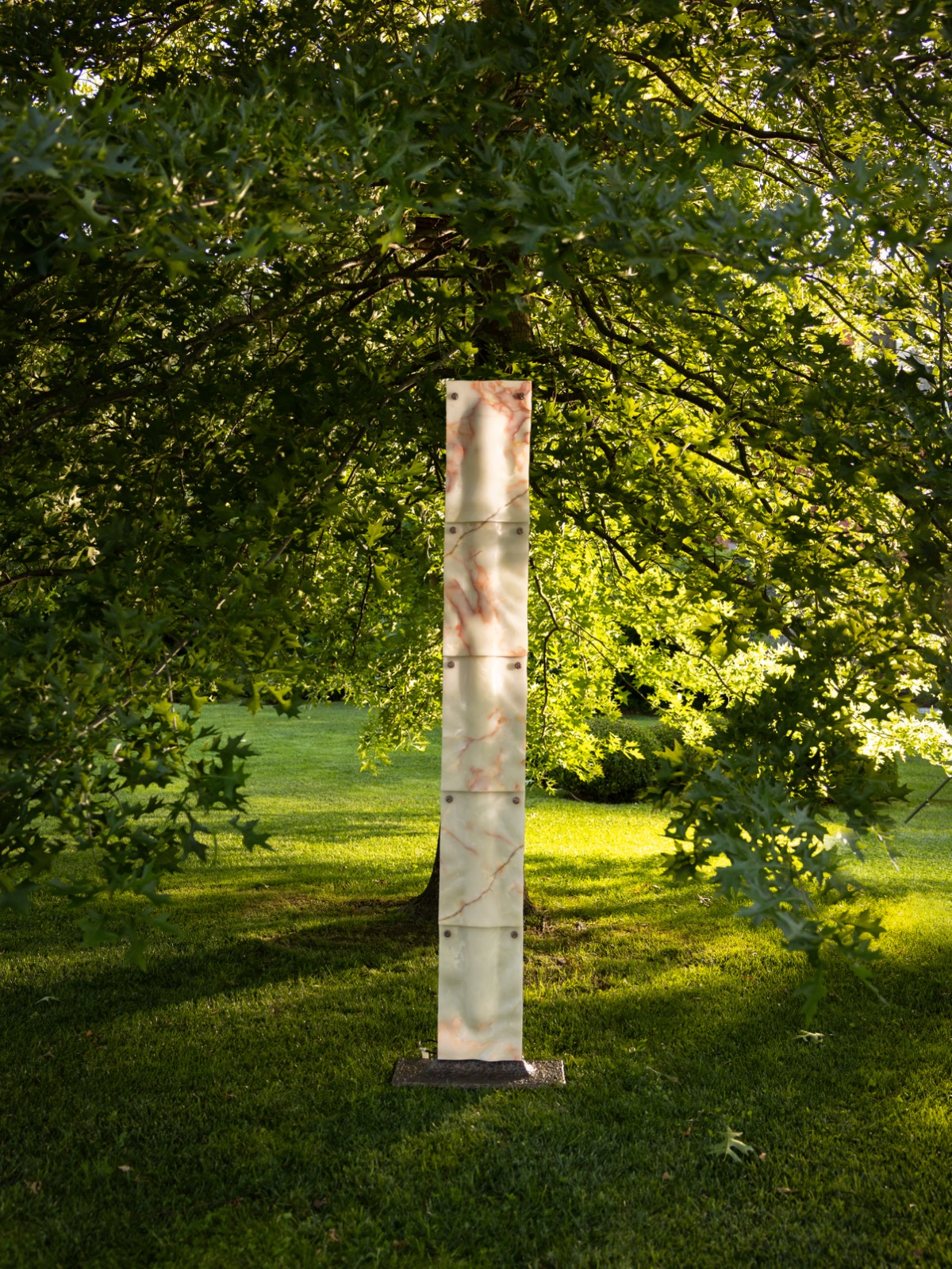 Installation — marble column under oak, Villa Marie